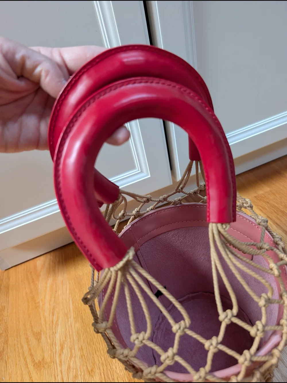 Staud Pink Moreau Macramé Net and Leather Bucket Bag With Red Handles